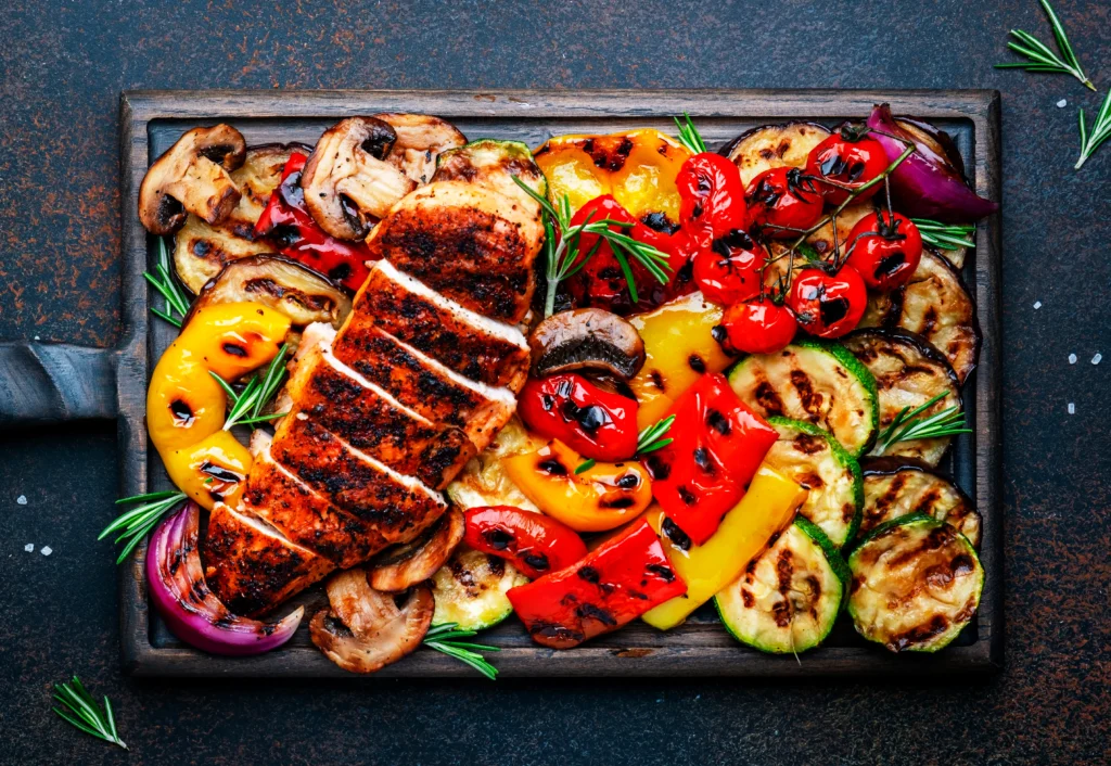 Juicy grilled chicken marinated in a flavorful blend of garlic, herbs, olive oil, lemon juice, and spices, served fresh off the grill.