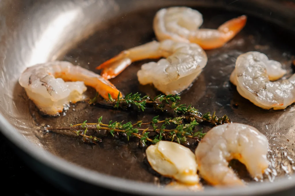 Garlic Butter Shrimp Pasta served with tender linguine, juicy sautéed shrimp, garlic butter sauce, fresh parsley, and grated Parmesan.