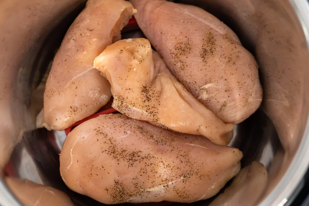 Slow Cooker Italian Chicken Recipe served with tender chicken, herbs, and vegetables for an easy weeknight family dinner