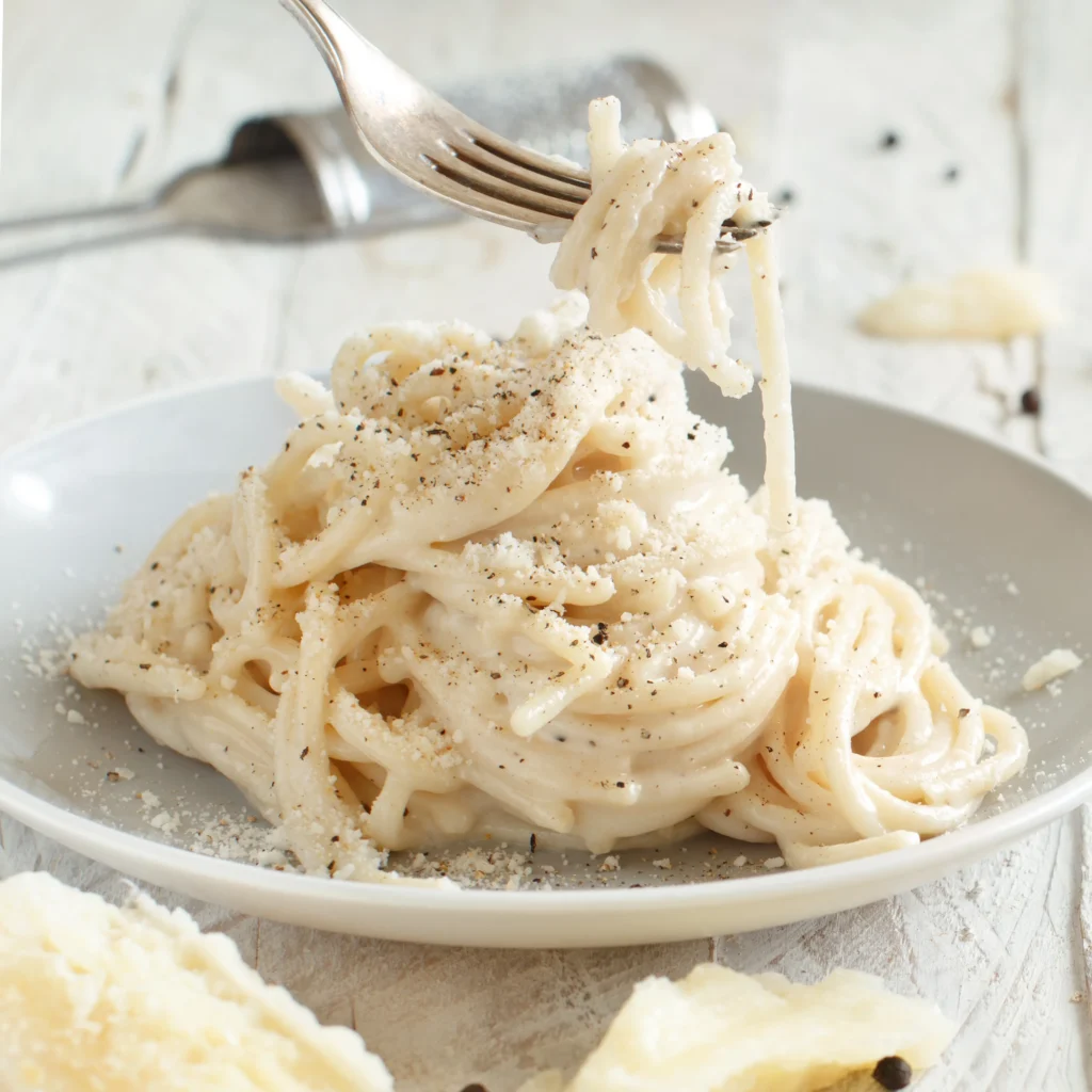 Authentic Spaghetti Cacio e Pepe Recipe with Pecorino Romano cheese and black pepper