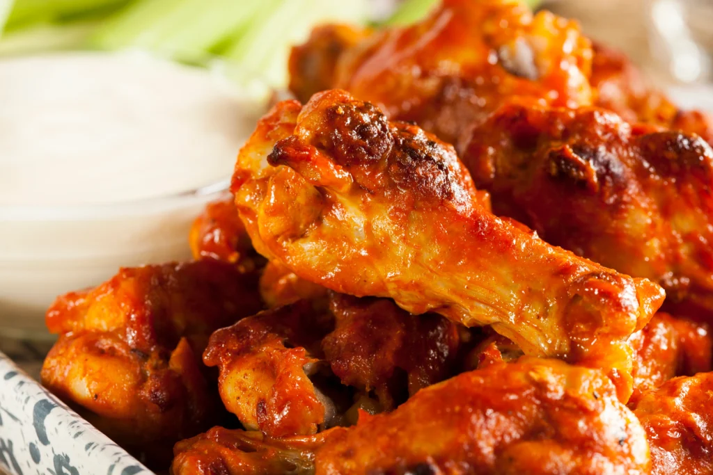 Crispy air fryer chicken wings with golden crunchy skin served with dipping sauce
