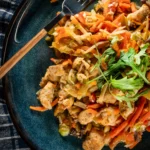 Easy Egg Roll in a Bowl with ground meat, cabbage, carrots, and Asian-inspired flavors