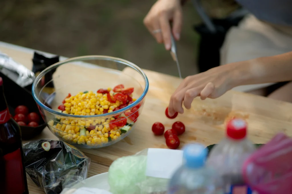 Fresh Summer Corn Salad with tomatoes, avocado, red onion, cilantro, and lime dressing.