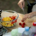 Fresh Summer Corn Salad with tomatoes, avocado, red onion, cilantro, and lime dressing.