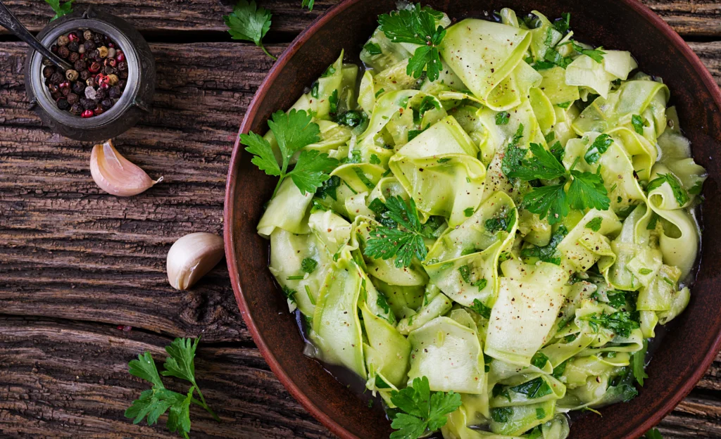 Green Goddess Salad with fresh greens, vegetables, and creamy dressing