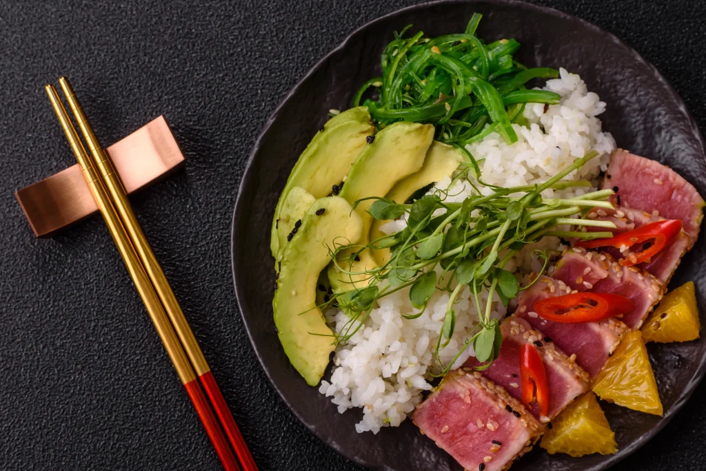 Easy healthy tuna rice bowl with vegetables and spicy sauce