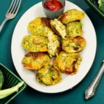 Cheesy baked broccoli bites with a golden, crispy cheese coating