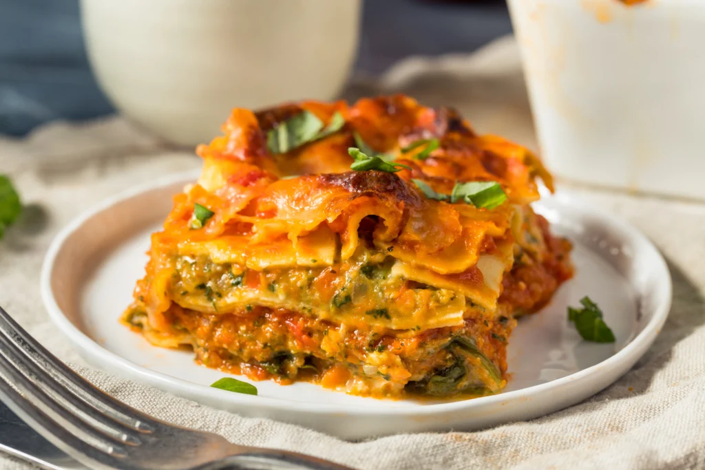 Lazy Dump Lasagna with layers of pasta, tomato sauce, ground beef, and melted cheese
