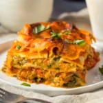 Lazy Dump Lasagna with layers of pasta, tomato sauce, ground beef, and melted cheese
