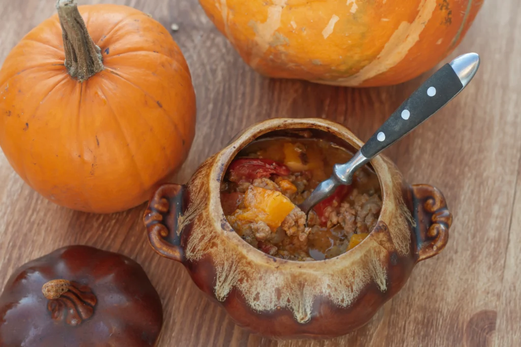 Homemade pumpkin chili recipe with beans, ground beef, and warm spices