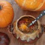 Homemade pumpkin chili recipe with beans, ground beef, and warm spices